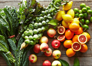 a group of fruits and vegetables on a wood surface Healthy Weight Loss Diets Esher